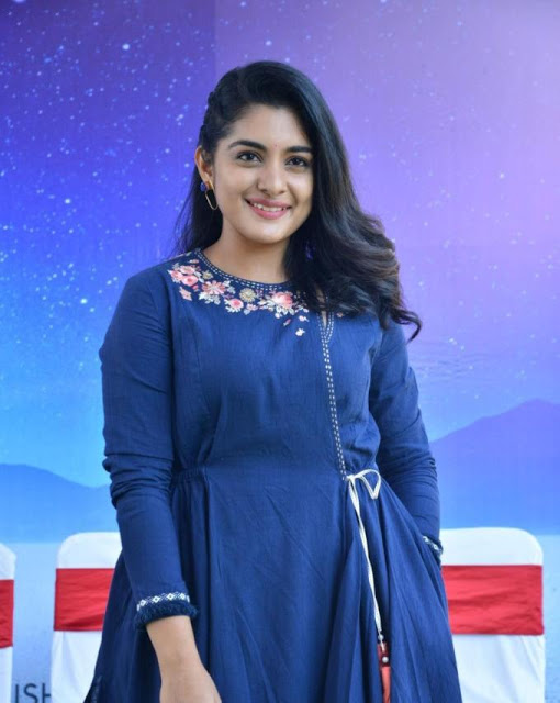Nivetha Thomas Stills In Blue Dress At Tamil Movie Opening 10